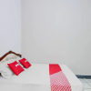 Отель OYO 90543 An-nur Guest House Syariah, фото 24