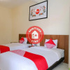 Отель OYO 709 Menjangan Residence at Klayatan, фото 4