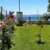 Отель Amarynthos Beachfront Vacation House with Garden, фото 13
