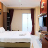 Отель Comfy Studio Signature Park Apartment, фото 3