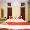 Отель OYO 11696 Holiday Inn Guest House, фото 6