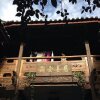 Отель Old House Inn в Лицзяне