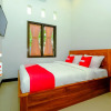 Отель OYO 2284 Grand Villa Meninting, фото 4