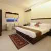 Отель Treebo Maniram Palace, фото 4