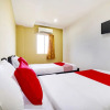 Отель Oyo 44058 Motel Sre Bayam, фото 7