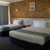 Отель Sunshine Coast Motor Lodge в Вумбае