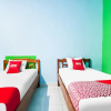 Отель OYO 91861 Pemuda Kemuning Guest House, фото 11
