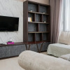 Отель Cozy and New 2BR at Marigold Nava Park Apartment, фото 1