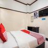 Отель OYO 3892 Athaya Guesthouse Syariah, фото 6