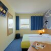 Отель B&B Hotel Frankfurt Hahn-Airport в Лаутценхаузене