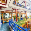 Отель Dali Shuanglang Suiyuanju Inn, фото 9