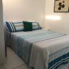 Отель Apartamento com Piscina a Beira Mar, фото 4