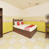Отель OYO 90792 Hezza Inn, фото 9