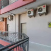 Отель Oyo 3255 Enam Delapan Guest House Syariah, фото 8