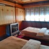 Отель Tuo Tuo Guest House, фото 6