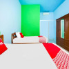 Отель OYO 91861 Pemuda Kemuning Guest House, фото 12