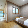 Отель Gangneung Way to Gyeongpodae Pension, фото 7