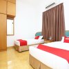 Отель OYO 89523 Villa Sri Mayang, фото 26