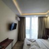 Отель Leo Group Apartment 14 302B Sunrise Batumi, фото 6