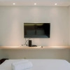 Отель Homey And Warm Studio Amazana Serpong Apartment, фото 4