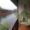 Отель Fenghuang Memory Linjiang Inn, фото 16