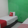 Отель OYO 3449 Putri Garuda Syariah, фото 5