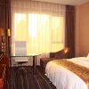 Отель Xinfusheng Yihai International Hotel - Qingdao, фото 3