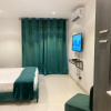 Отель Gardenia Suites, фото 1