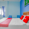 Отель Super OYO 90072 Apri Inn Syariah, фото 16