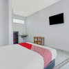 Отель OYO 90521 Rumah Ibu, фото 14