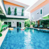 Отель Villa Rajapruek Entire 3 villa with pool near Airport and City Center, фото 16