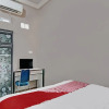 Отель OYO 92456 Putri Homestay Syariah, фото 1