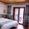 Отель Yangshuo Moon Villa Homestay (Yulonghe Scenic Area Branch), фото 1