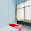 Отель SPOT ON 92072 Restu Ibu Homestay Syariah, фото 1