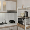 Отель Minimalist And Comfort 2Br At Springlake Summarecon Bekasi Apartment, фото 3