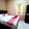 Отель OYO 91026 Kasmarani Residence Syariah, фото 3