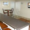 Отель Lake Grassy Inn & Suites, фото 1