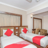 Отель OYO 461 New Rainbow Business Hotel, фото 5