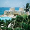 Отель GEOHoliday @ Guana Bay Beach Villas, Phillipsburg, St Maarten Dutch Caribbean в Филипсбург