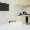 Отель Elegant And Modern Studio At Sky House Bsd Apartment, фото 1