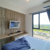 Отель Homey And Clean Studio At Sky House Alam Sutera Apartment, фото 1