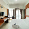 Отель Monochrome Studio Room At Taman Melati Jatinangor Apartment, фото 6