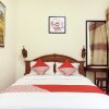 Отель OYO 465 Alam Citra Bed & Breakfast, фото 24