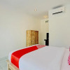 Отель OYO 90337 Wiguna Homestay, фото 19