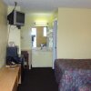 Отель Economy Inn Crossville, фото 7