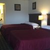 Отель Houston Inn and Suites, фото 4
