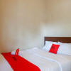 Отель Kost Harmoni by RedDoorz, фото 3