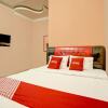 Отель OYO 92464 Efniati Homestay Syariah, фото 5