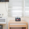 Отель Minimalist Studio Room At Aeropolis Residence Apartment, фото 10