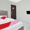 Отель OYO 91065 Guest House 19 Syariah, фото 9